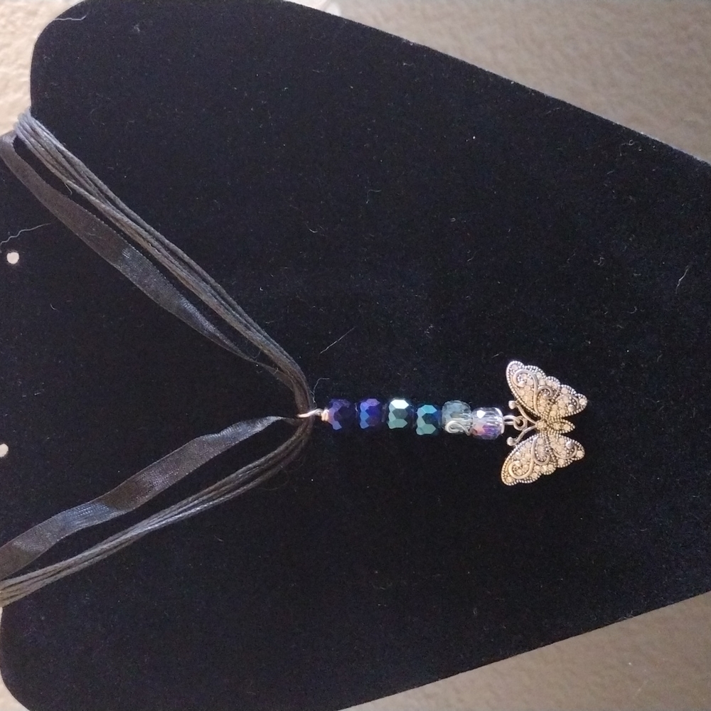 Wire wrapped beads with butterfly pendant necklace